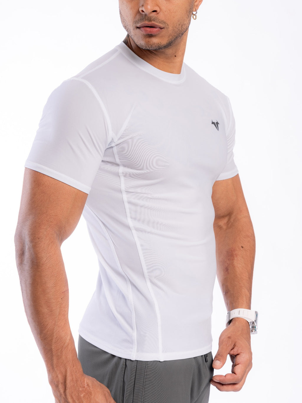 Polo Compresor Hombre FLOWING – Alto Rendimiento